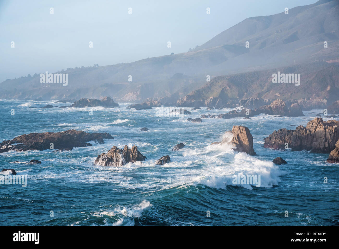 Crashing waves and rocky shores of the Monterey Peninsula. Stock Photo