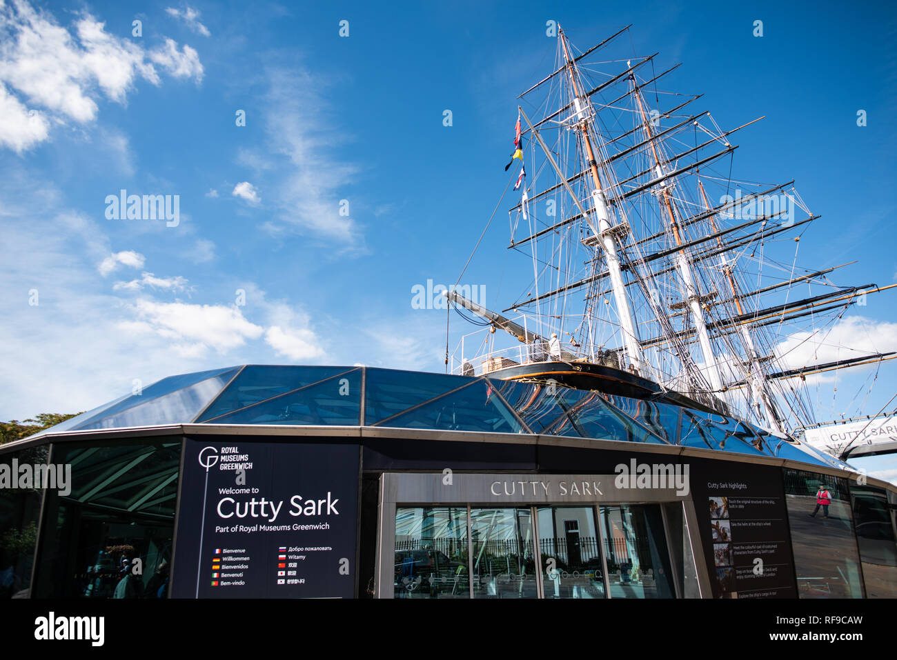 GREENWICH, UK - The Cutty Sark is a restored historic British clipper sailing ship that is now open as a tourist attraction in Greenwich, London. It was built in 1869 and in active service until 1895. In its heyday as a trader vessel, it was known as the fastest ship of its time. It was notable for its participation in the tea trade between Asia and Europe. When the opening of the Suez Canal created the opportunity for shorter and faster trips made by steam ships, the Cutty Sark was used to transport wool from Australia to Britain. Stock Photo