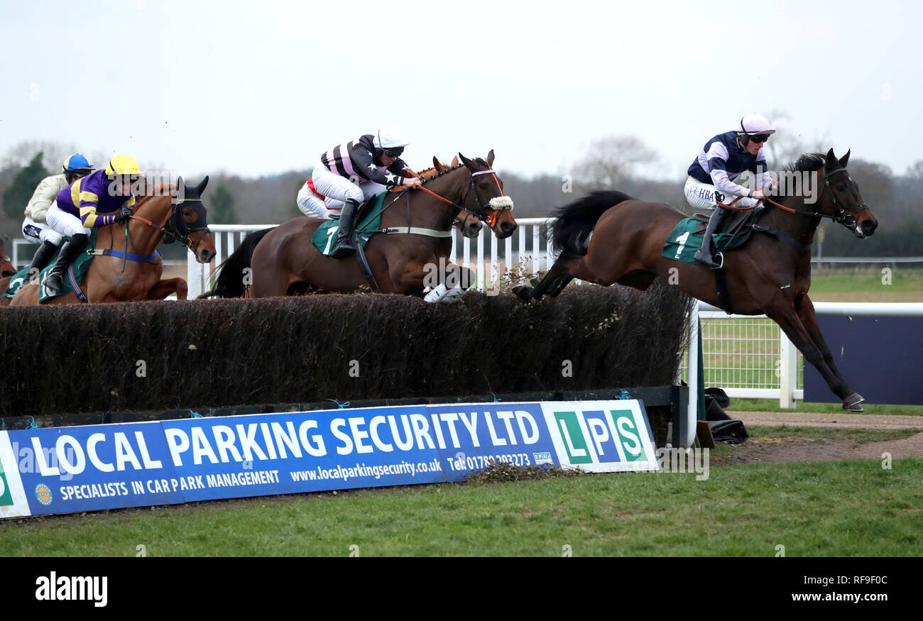 Brandon Hill ridden by Noel George (right) competes in the Overbury Stud Willoughby De Broke Open Hunters' Chase during Midlands Raceday at Warwick Racecourse. Stock Photo