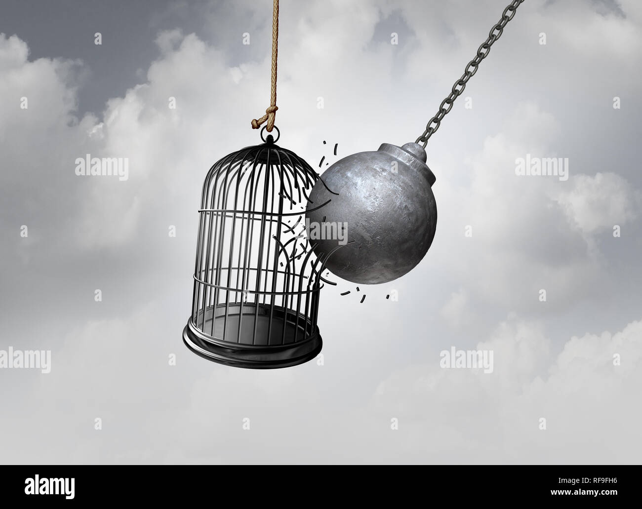Freedom cage and break Free concept as a wrecking ball liberating a birdcage breaking open a prison as an abstract idea of escaping an addiction. Stock Photo