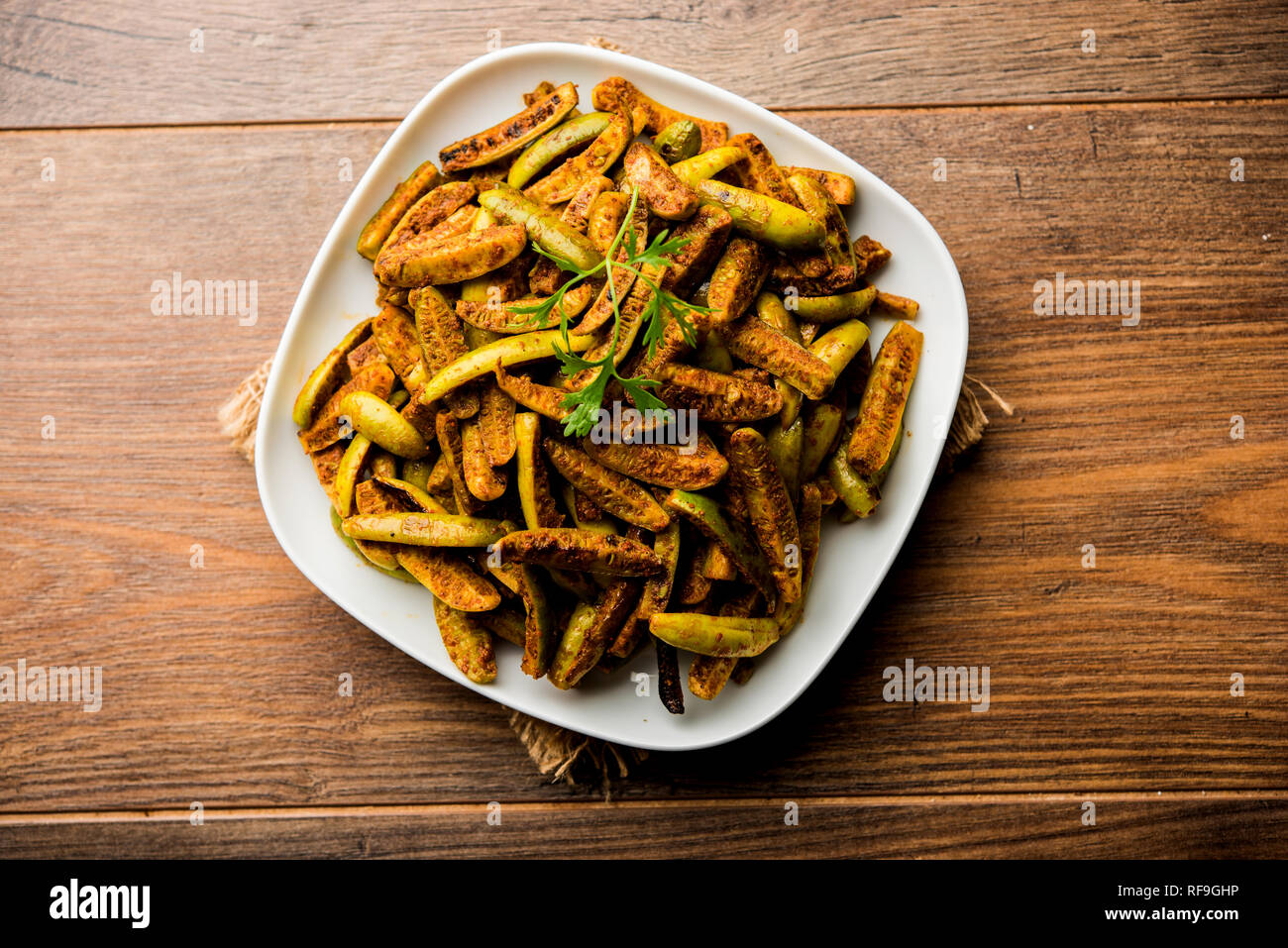 Tindora Sabzi / Tendli / tondli Fry also known as Ivy Gourd fry recipe. selective focus Stock Photo