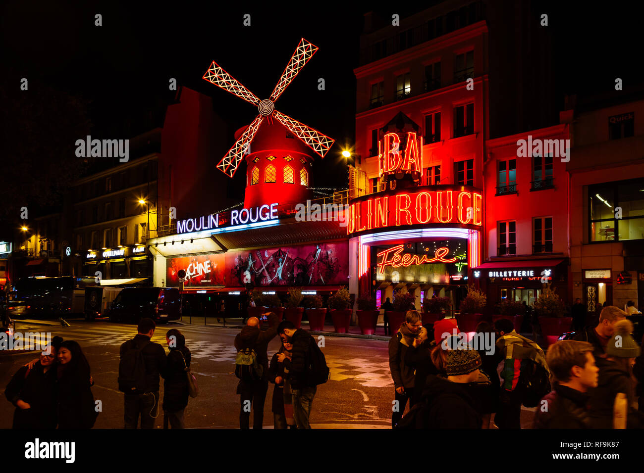 PARIS, FRANCE - NOVEMBER 9, 2018 - Moulin Rouge by night, is a famous cabaret built in 1889, locating in the Paris red-light district of Pigalle Stock Photo