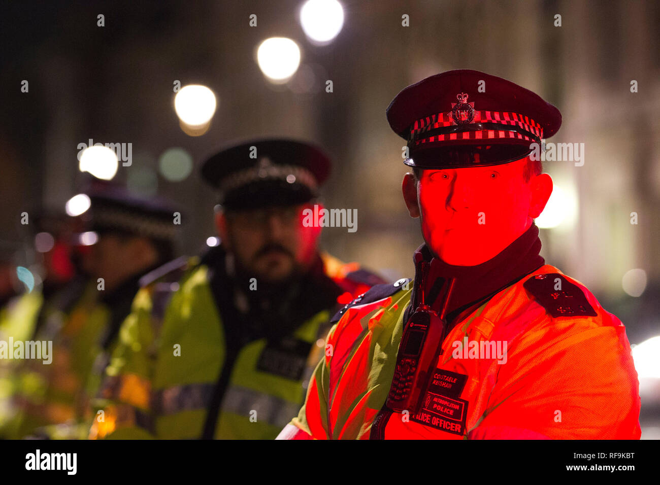 Police officers outside Big Ben and The Houses of Parliament in London ...