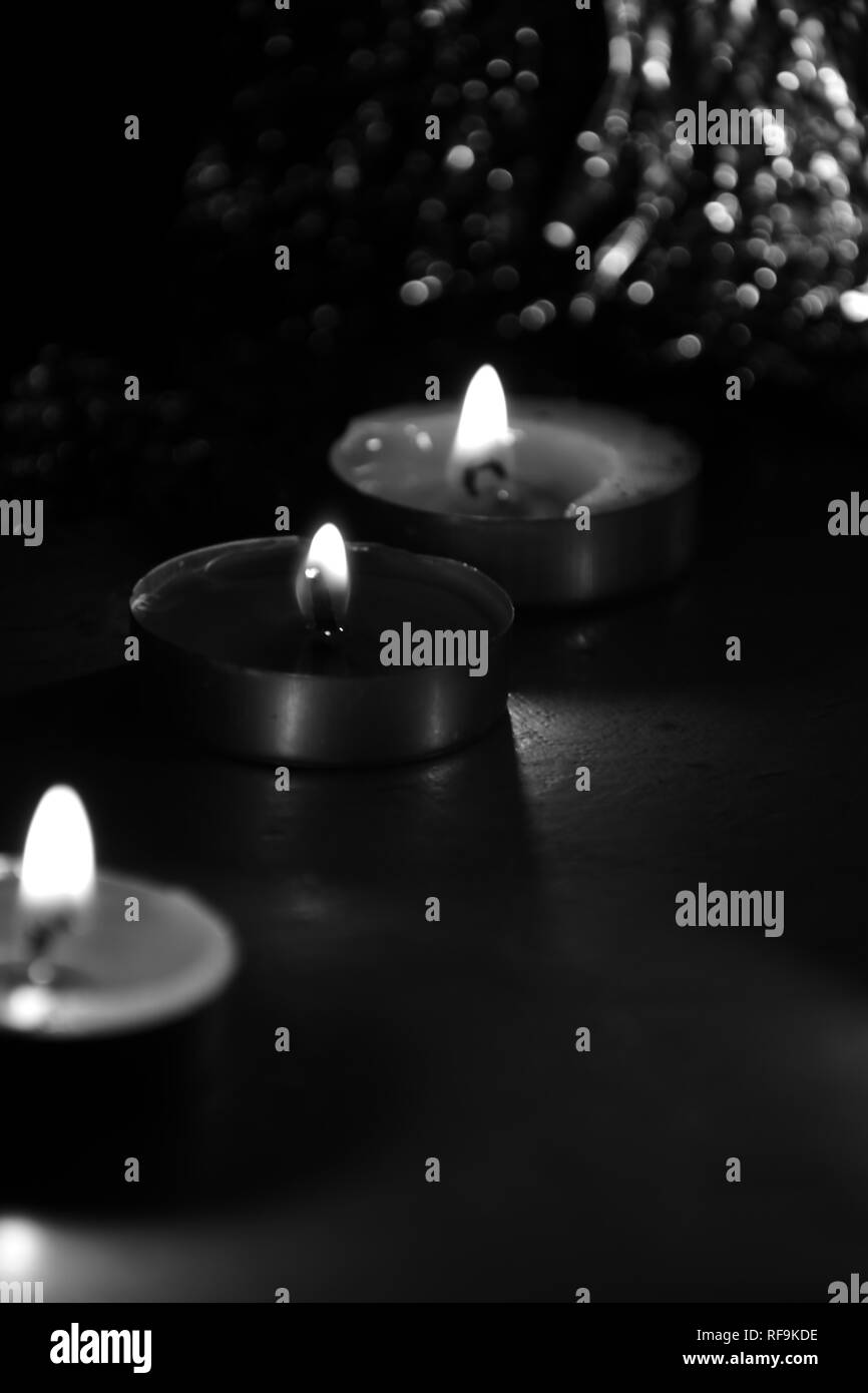 Beautiful Tea candle light view in darkness Stock Photo Alamy