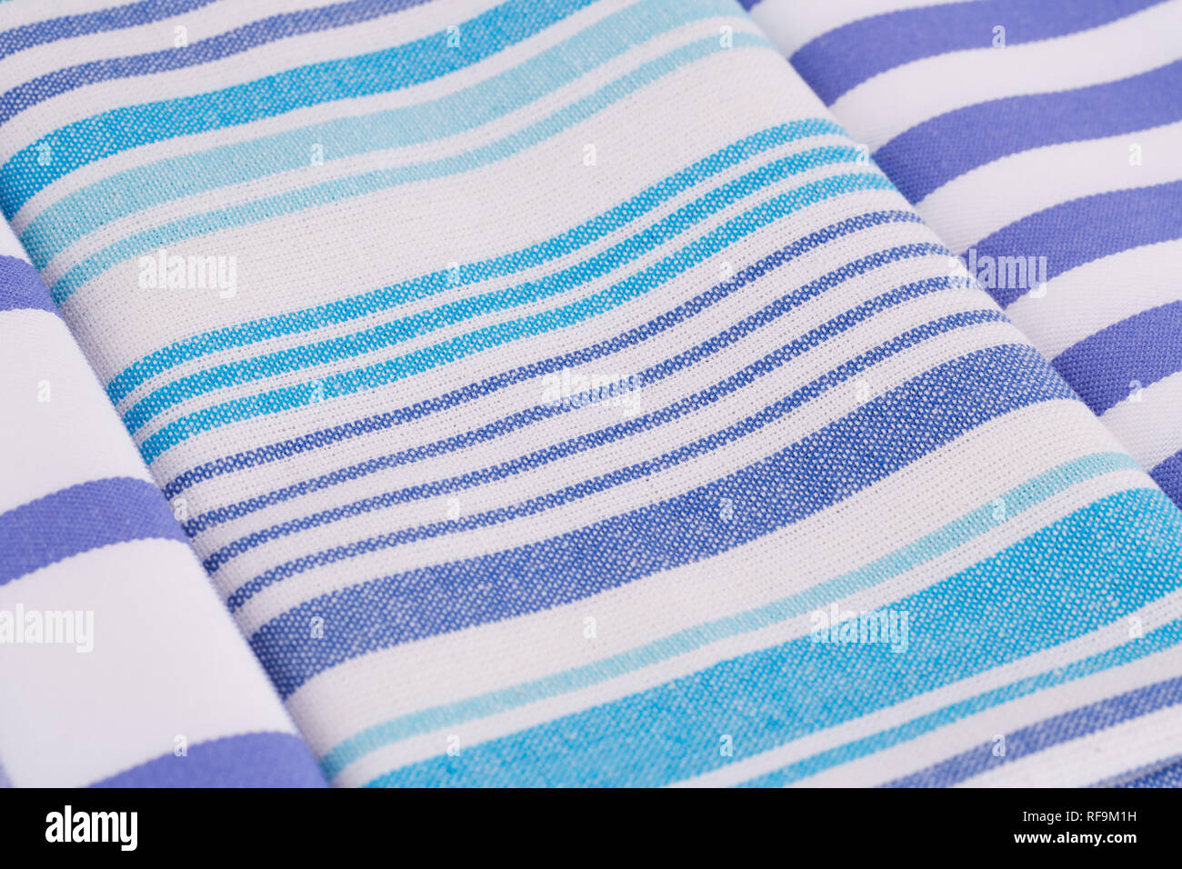 Blue and white kitchen towels closeup picture Stock Photo - Alamy