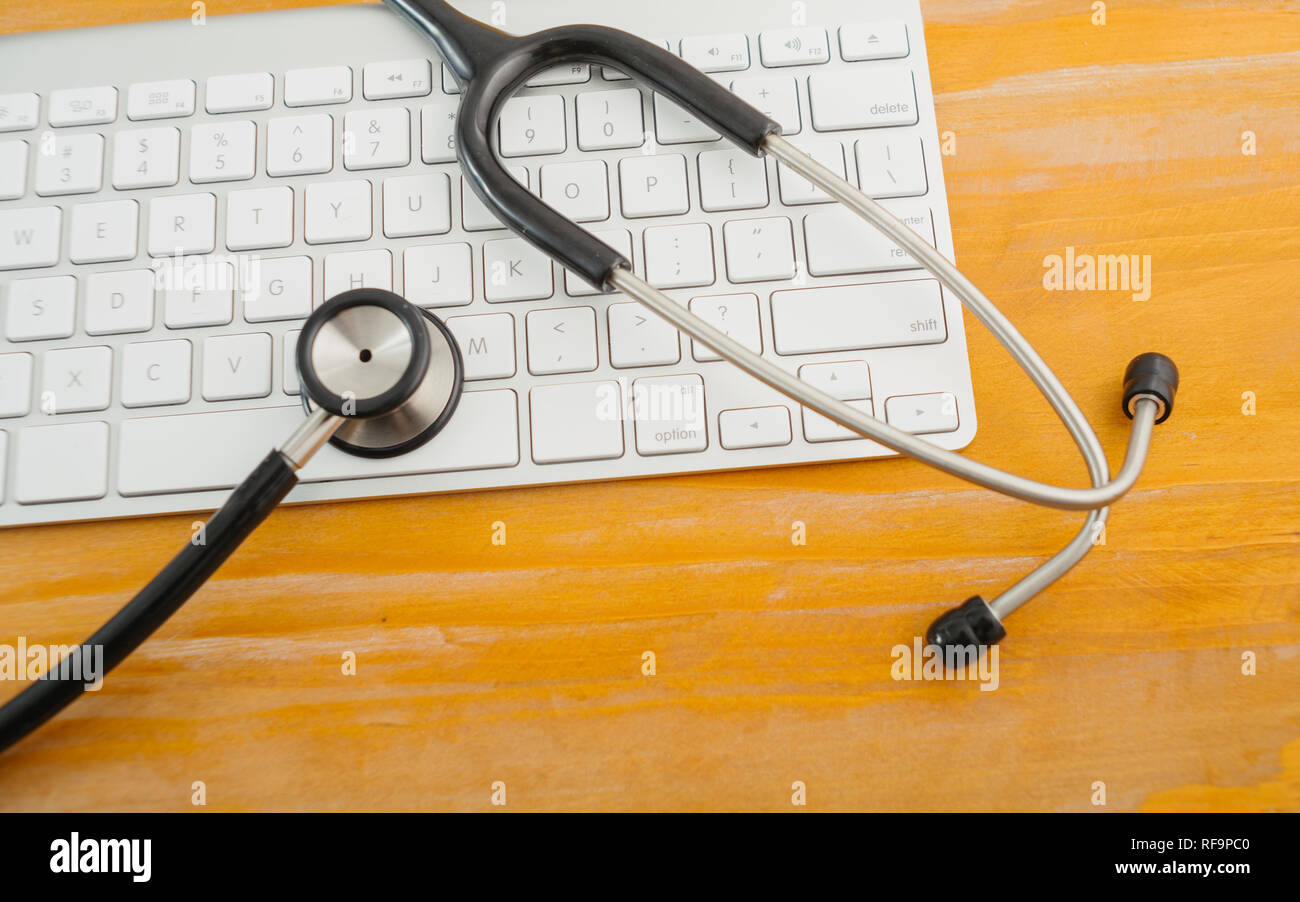 Electronic medical, stethoscope on Keyboard Stock Photo - Alamy