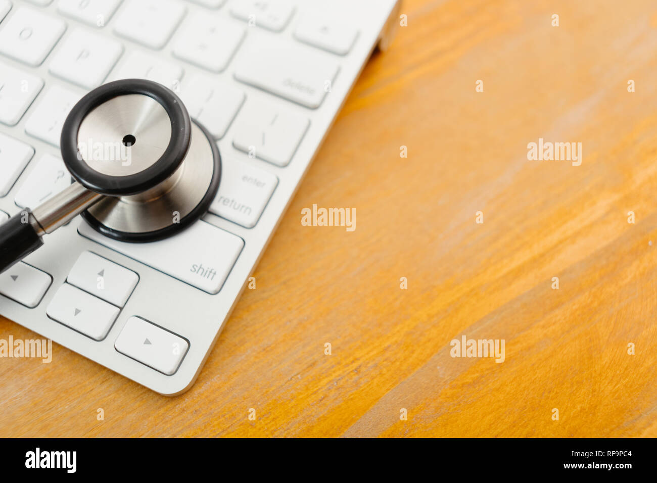 Electronic medical, stethoscope on Keyboard Stock Photo - Alamy