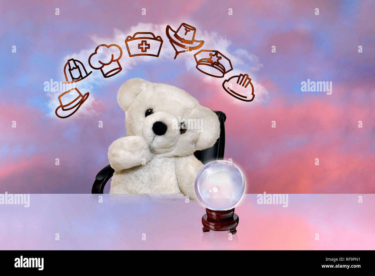 Teddy Bear Contemplating Career Path with crystal ball and sky background  Stock Photo - Alamy