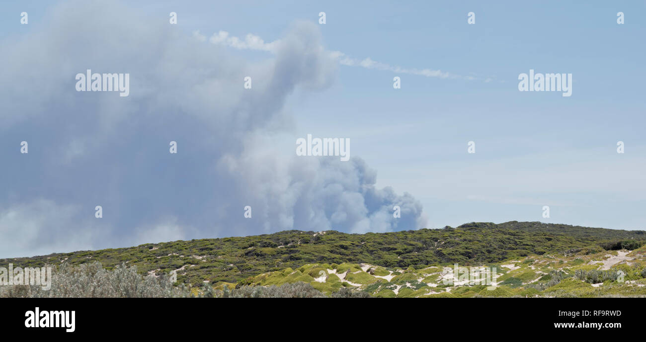 A bush fire burning in the distance on Kangaroo Island Stock Photo