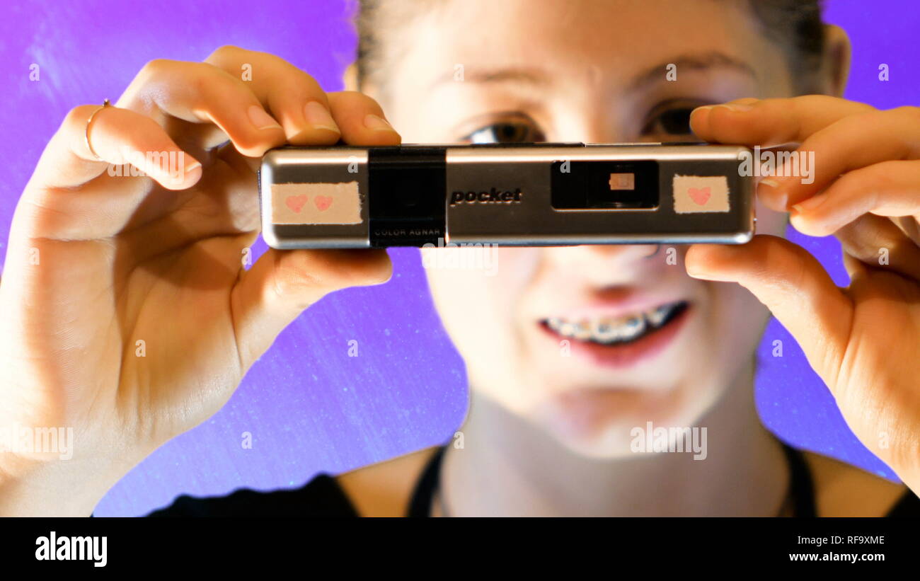 Teenage Girl Takes A Picture With A Vintage Camera Footage Ideal For The Return To Aesthetics And Vintage Tacnology Stock Photo Alamy
