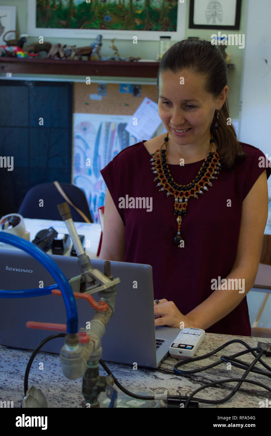 A portrait of a cheerful female science teacher working at a international school Stock Photo