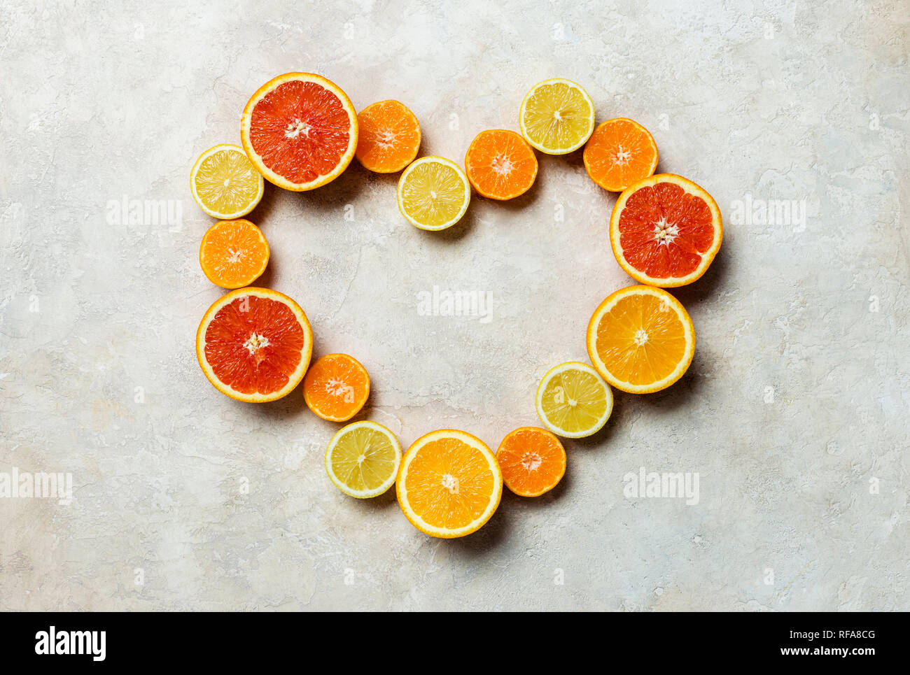 Citrus fruit heart background. Different kind of citrus orange