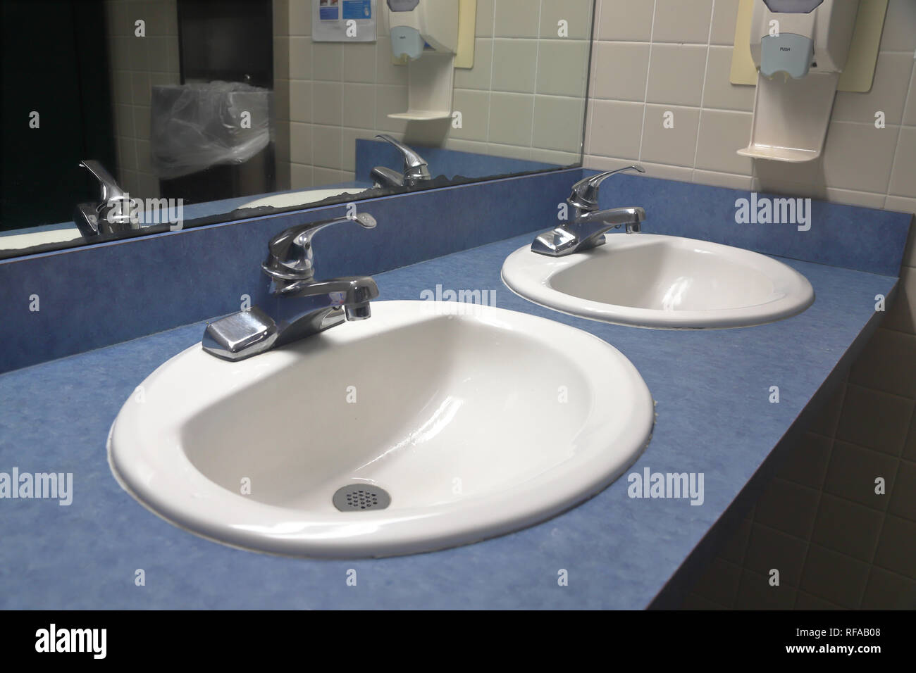 Sinks in public restroom Stock Photo
