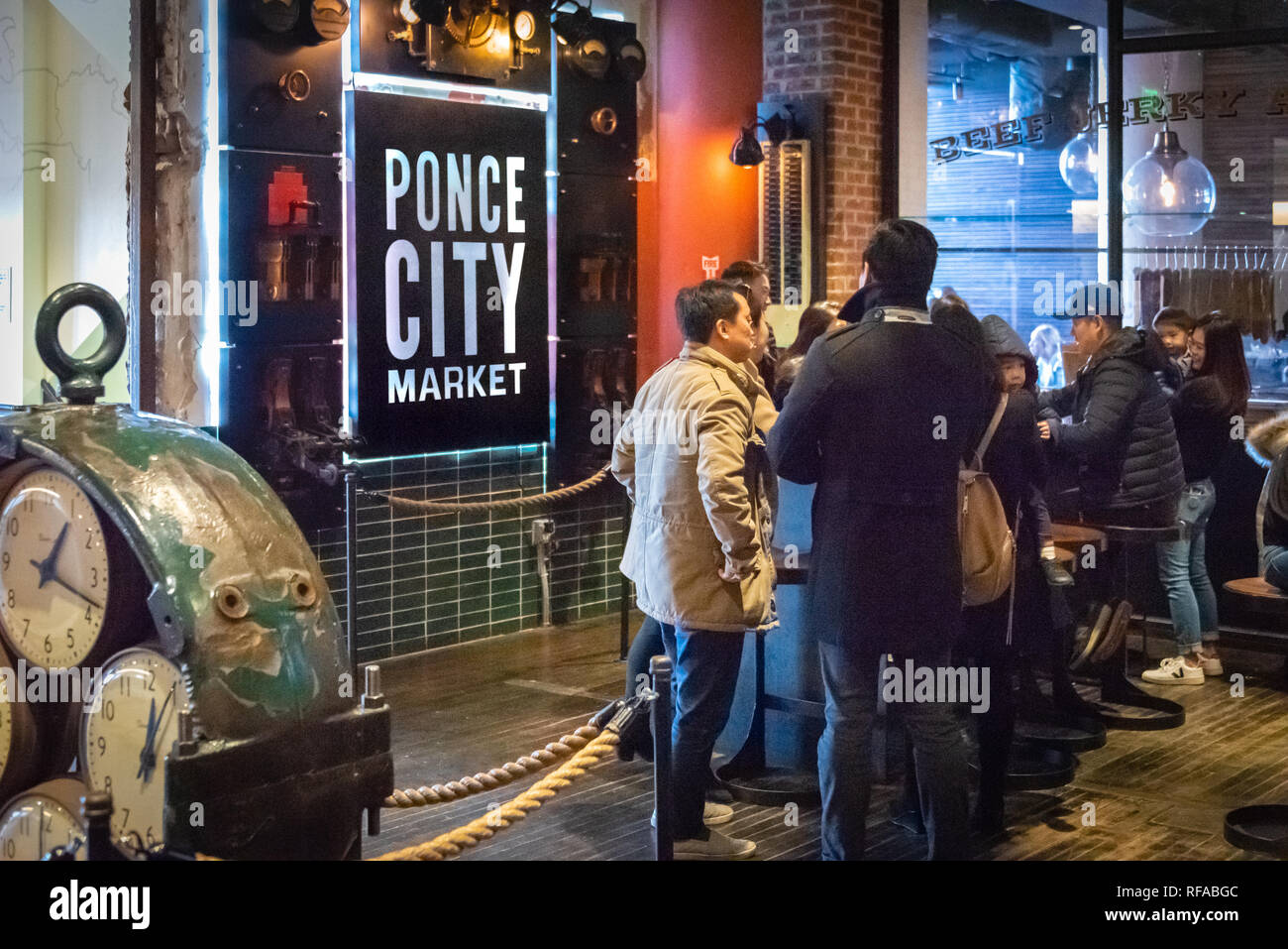 People gathering in the Central Food Court at Ponce City Market in Atlanta, Georgia. (USA) Stock Photo