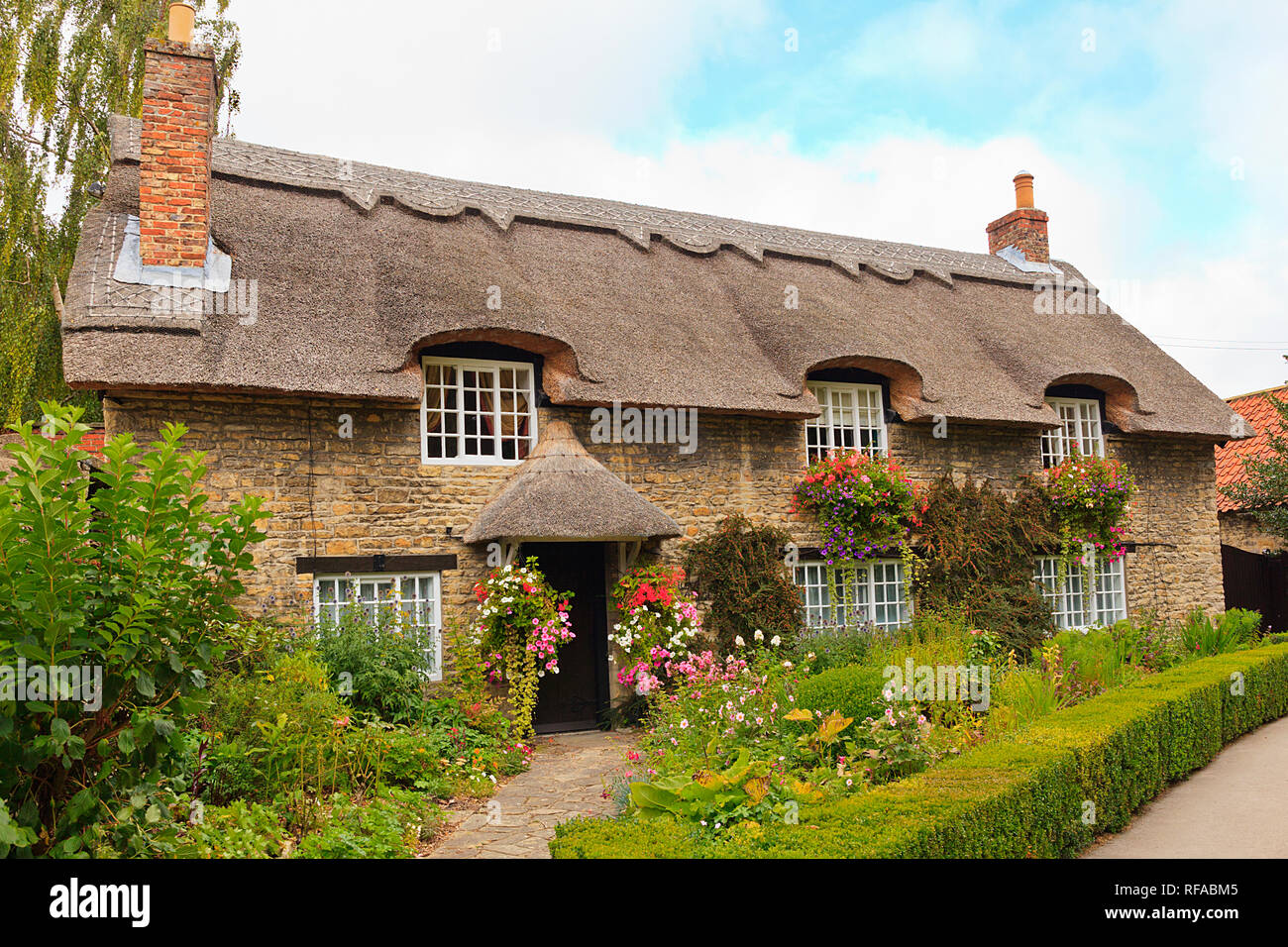 Thatched Cottage by the Beck in ThorntonleDale North Yorkshire Stock Photo Alamy