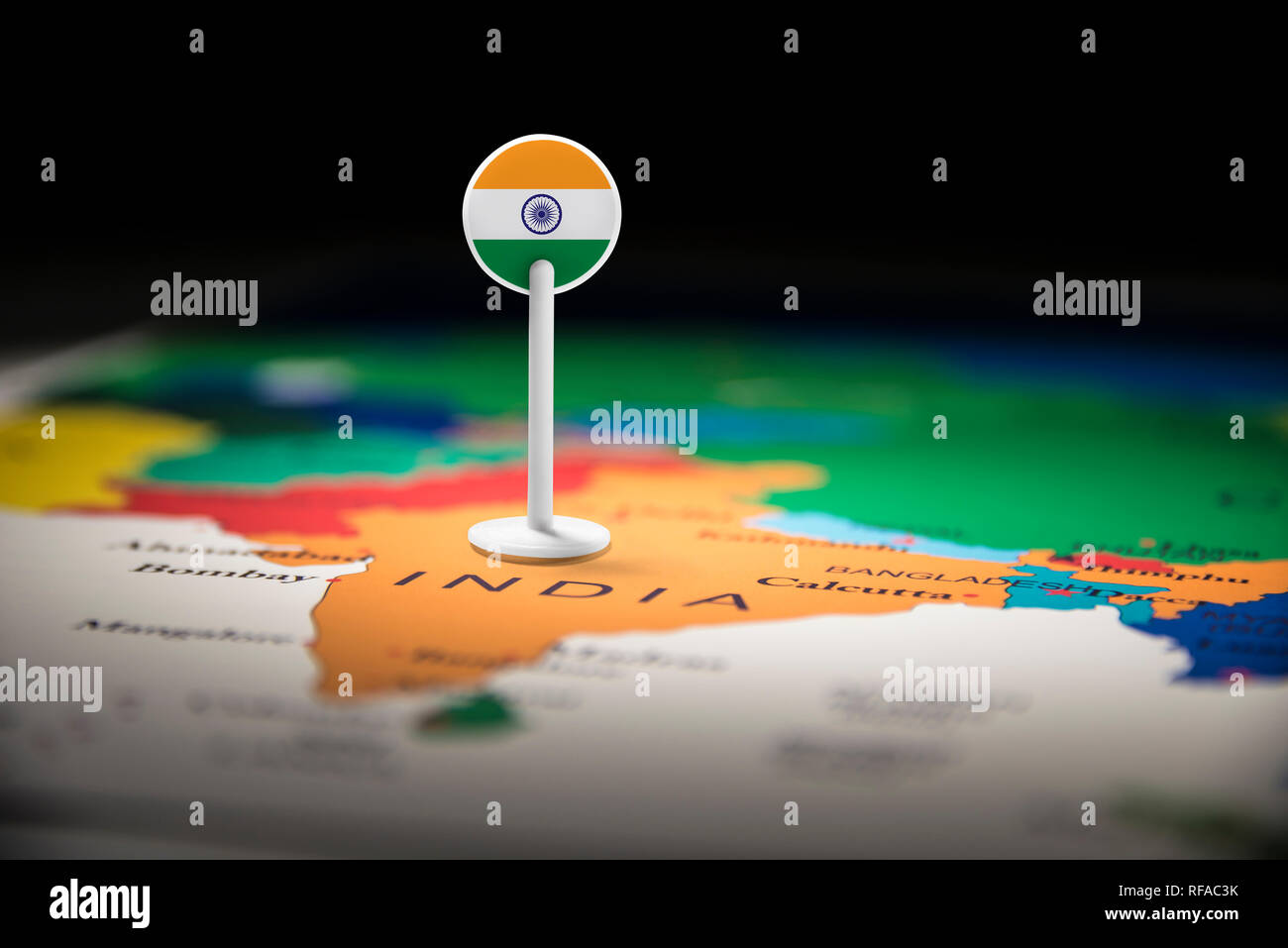 India marked with a flag on the map Stock Photo