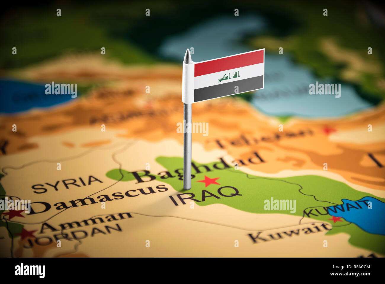 Iraqi marked with a flag on the map Stock Photo