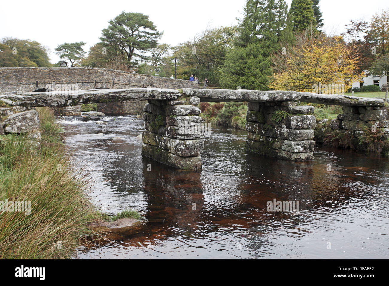 Ancient clapper bridge over the East Dart river at Postbridge Dartmoor ...