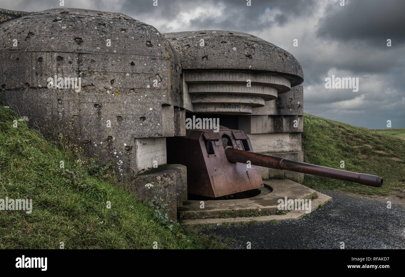 The German gun battery of Longues-sur-Mer commanded a strategic location overlooking the D-Day landing beaches. There are four reinforced concrete pil Stock Photo