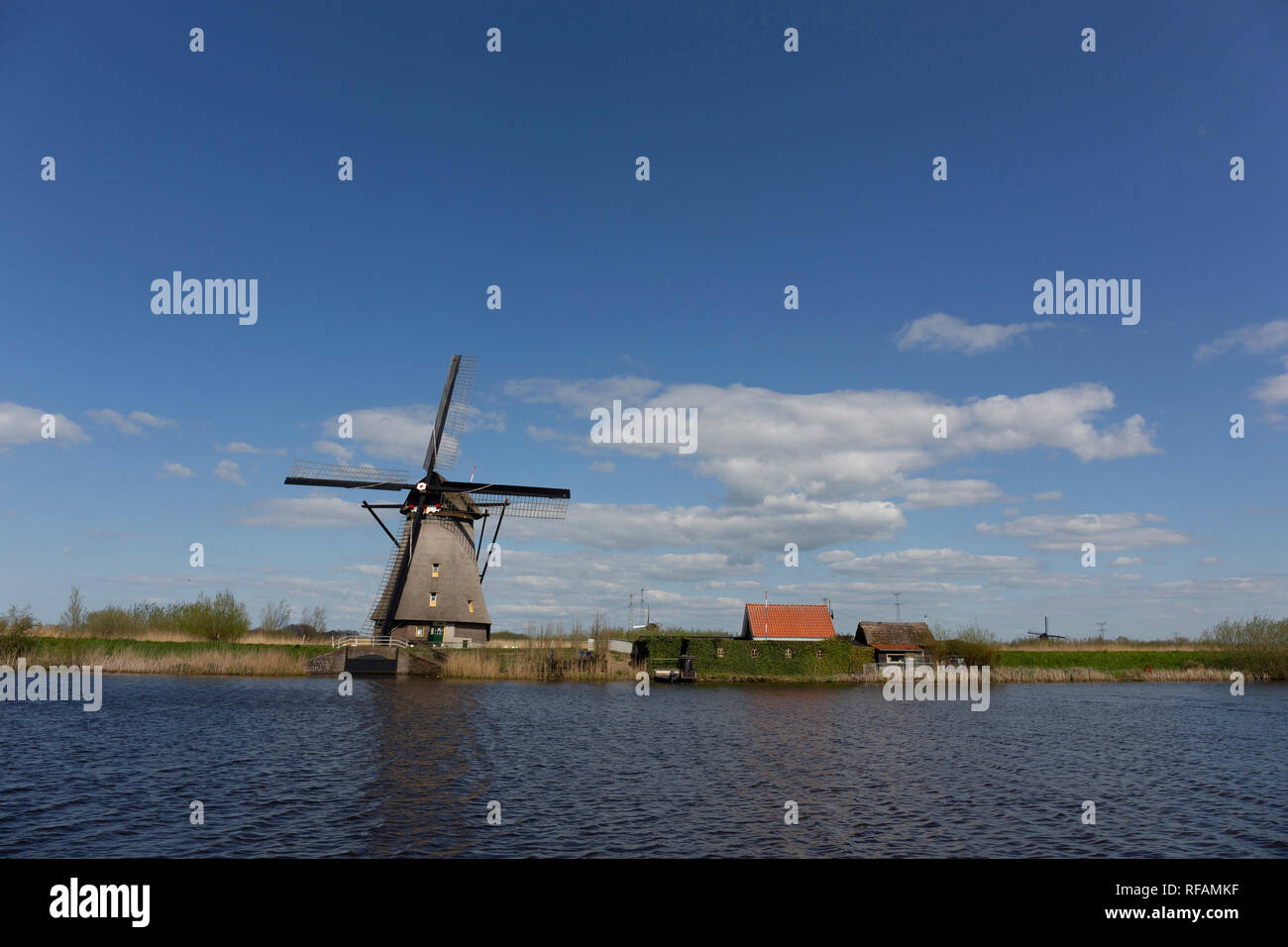 Netherlands rural lanscape with windmills at famous tourist site Kinderdijk in Holland, Europe Stock Photo