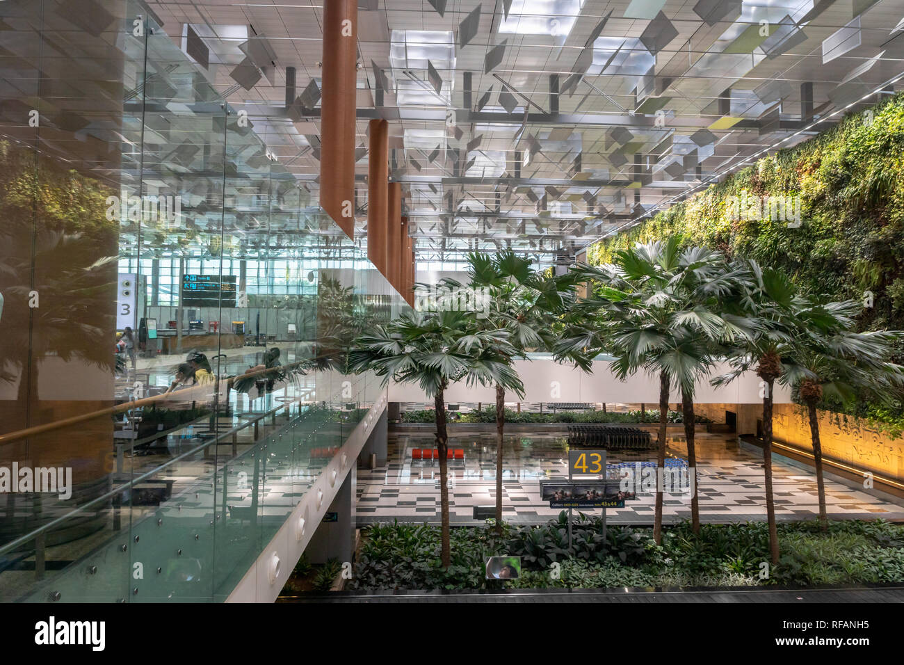 Singapore - January 2019: Singapore Changi Airport architecture and passengers. Singapore. Changi Airport is one of the largest airports in Asia. Stock Photo