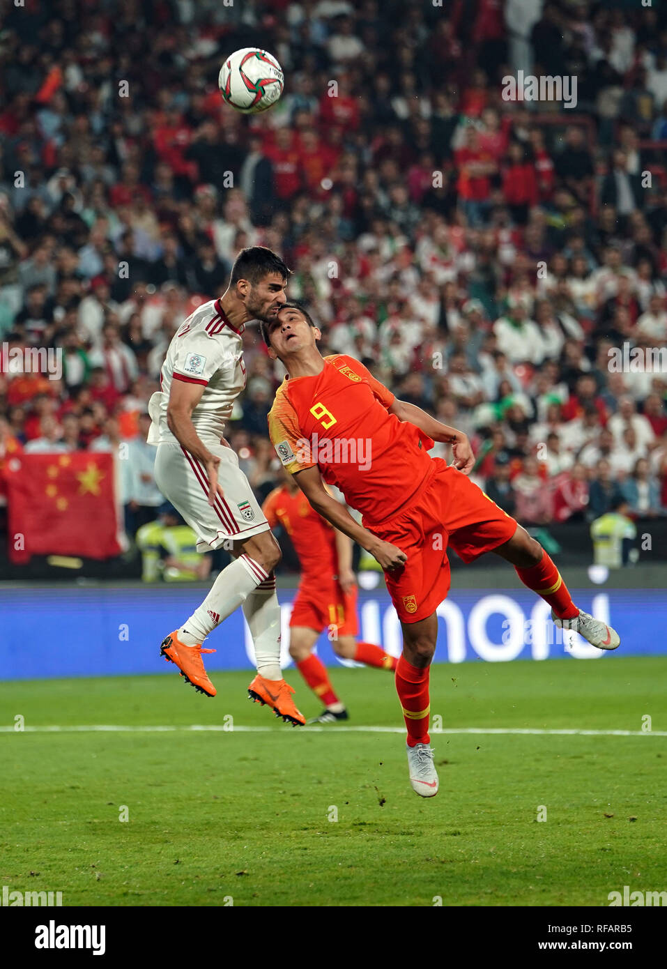 January 24, 2019 : Xiao Zhi of China heading the ball in front of Milad Mohammadi of Iran during China v Iran at the Mohammed Bin Zayed Stadium in Abu Dhabi, United Arab Emirates, AFC Asian Cup, Asian Football championship. Ulrik Pedersen/CSM. Credit: Cal Sport Media/Alamy Live News Stock Photo