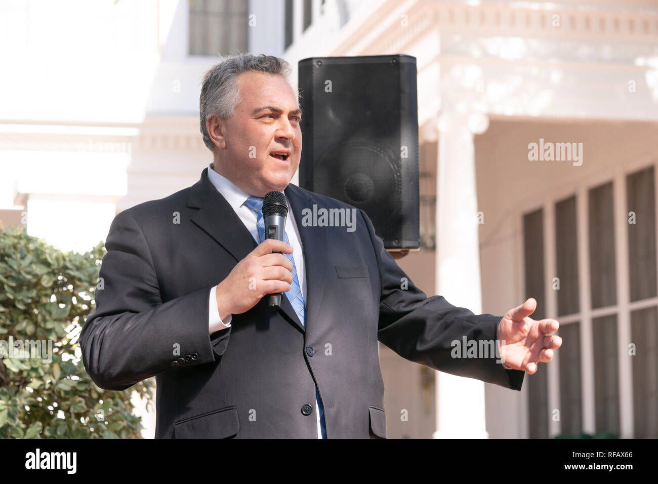 Ambassador Joe Hockey of Australia speaks to guests during the Great Mates Australia-Texas Barbecue at the Texas Governor's Mansion in Austin, TX. Abbott and Hockey worked to strengthen ties between the allies, discussing agriculture and high tech before eating Australian Vegemite burnt ends and HeartBrand Akaushi beef. Stock Photo