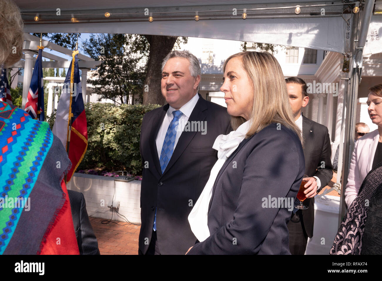 Ambassador Joe Hockey of Australia and wife Melissa Babbage visit with Texas Gov. Greg Abbott during the Great Mates Australia-Texas Barbecue at the Governor's Mansion. Abbott and Hockey worked to strengthen ties between the allies discussing agriculture and high tech before eating Australian Vegemite burnt ends and HeartBrand Akaushi beef. Stock Photo