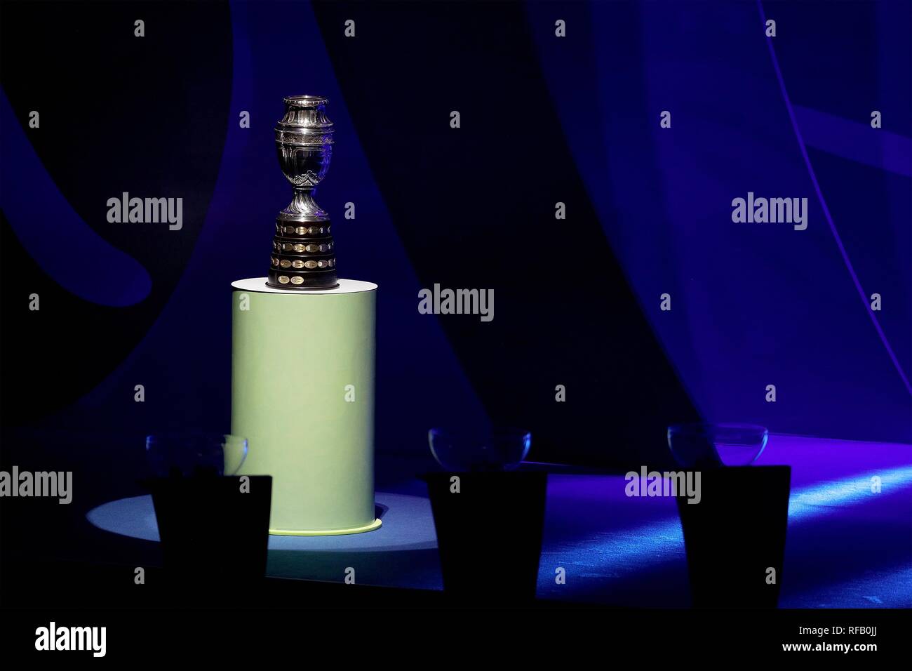 Rio De Janeiro. 24th Jan, 2019. Photo taken on Jan. 24, 2019 shows the trophy of the CONMEBOL Copa America at the official draw ceremony held in Rio de Janeiro, Brazil. The draw result was Brazil, Bolivia, Venezuela and Peru in Group A, Argentina, Colombia, Paraguay and Qatar in Group B, Uruguay, Ecuador, Japan and Chile in Group C. The tournament will be held from June 14 to July 7 in 5 cities in Brazil. Credit: Li Ming/Xinhua/Alamy Live News Stock Photo