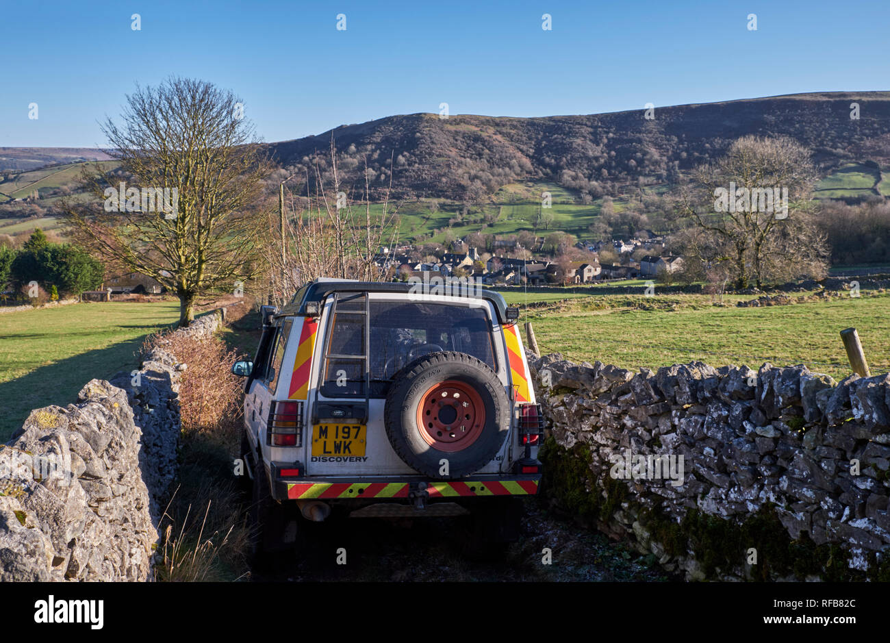 Land Rover on a narrow Green Lane above village of Bradwell. Peak District National Park, Derbyshire, England. Stock Photo