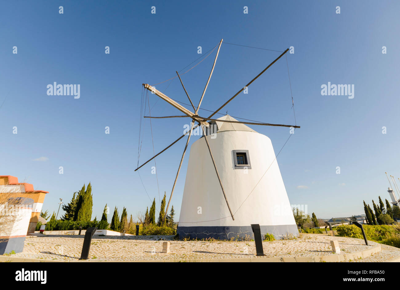 An old style windmill Moinho de Vento in a rural area in Algarve