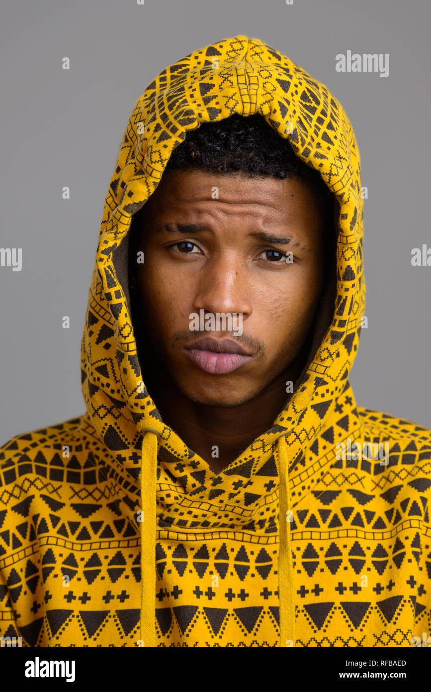 Face of young handsome African man looking at camera Stock Photo - Alamy