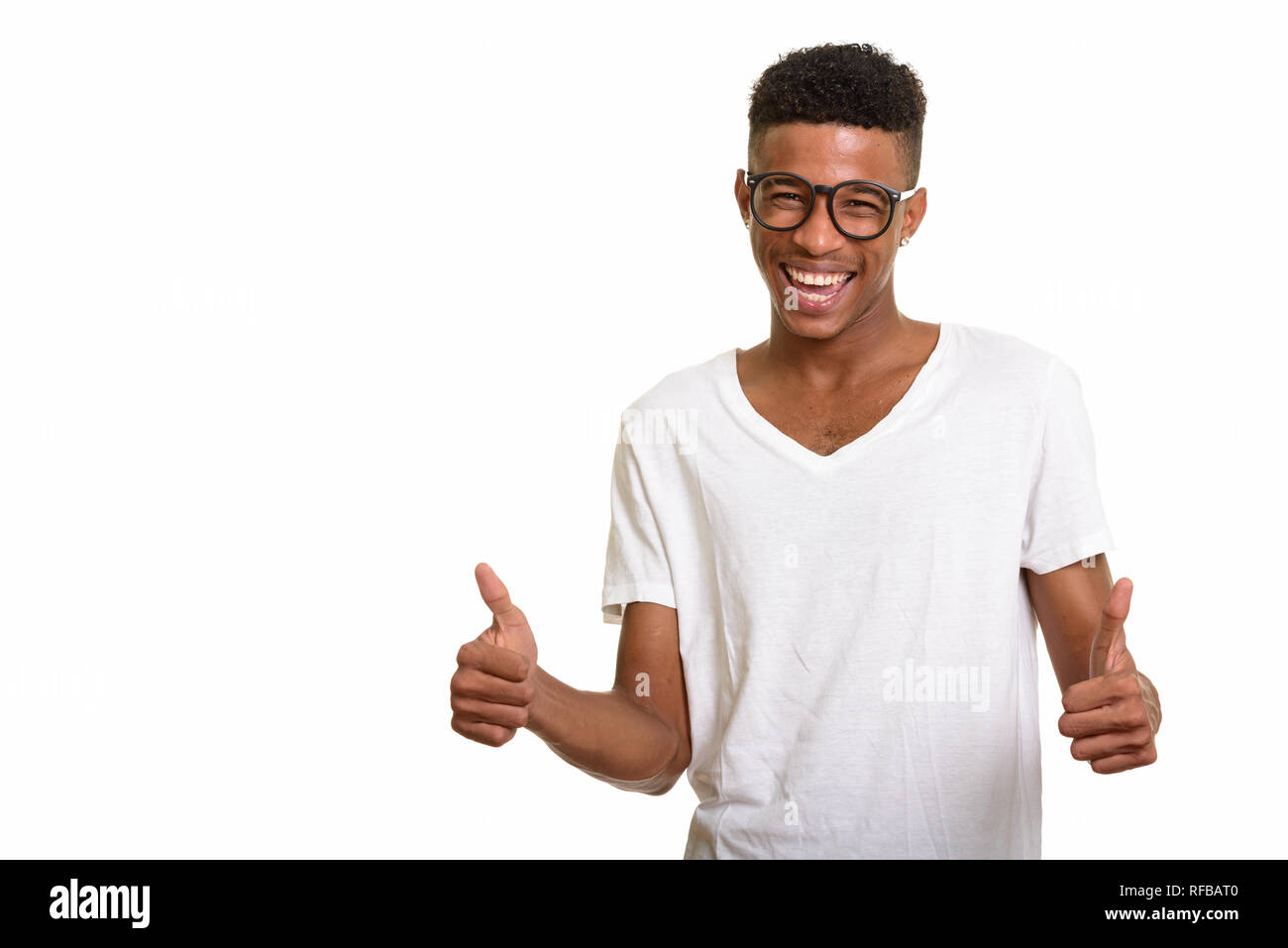 Young happy African man giving thumbs up Stock Photo - Alamy