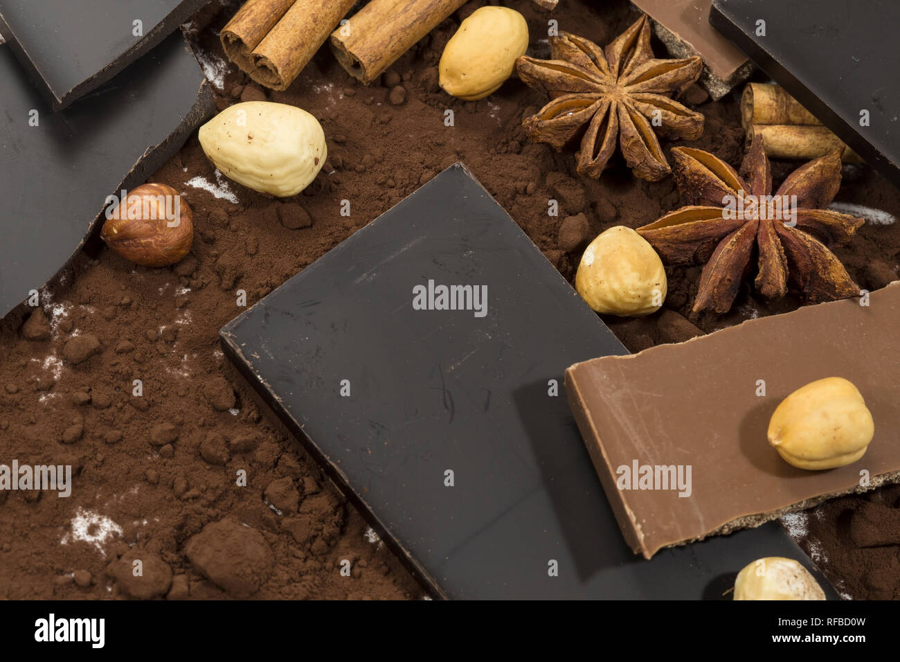Dark chocolate with hazelnuts and cocoa powder Stock Photo