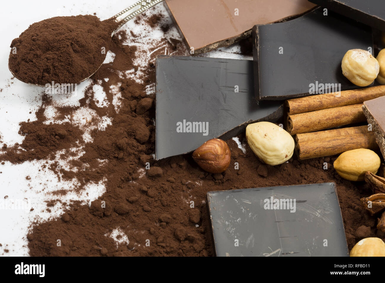 Dark chocolate with hazelnuts and cocoa powder Stock Photo