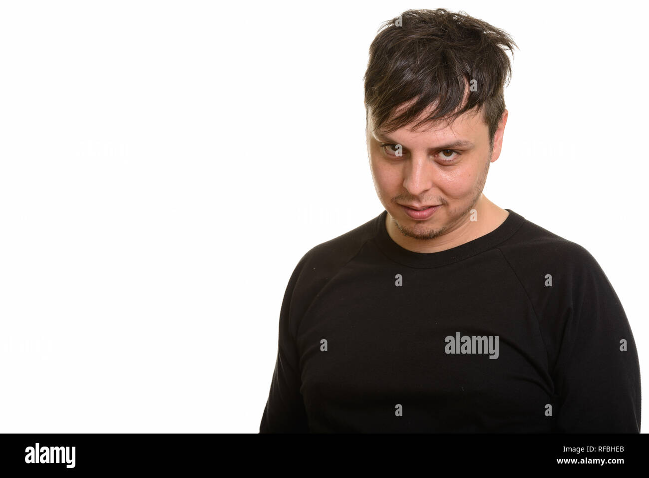 Studio shot of crazy Caucasian man smiling Stock Photo