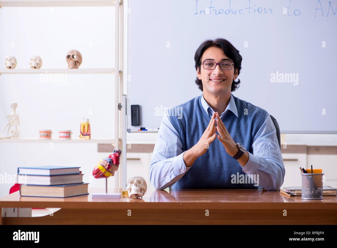Young lecturer teacher teaching anatomy Stock Photo Alamy