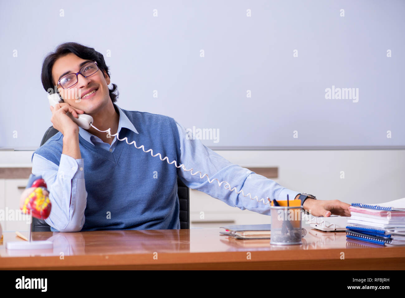 Young lecturer teacher teaching anatomy Stock Photo Alamy