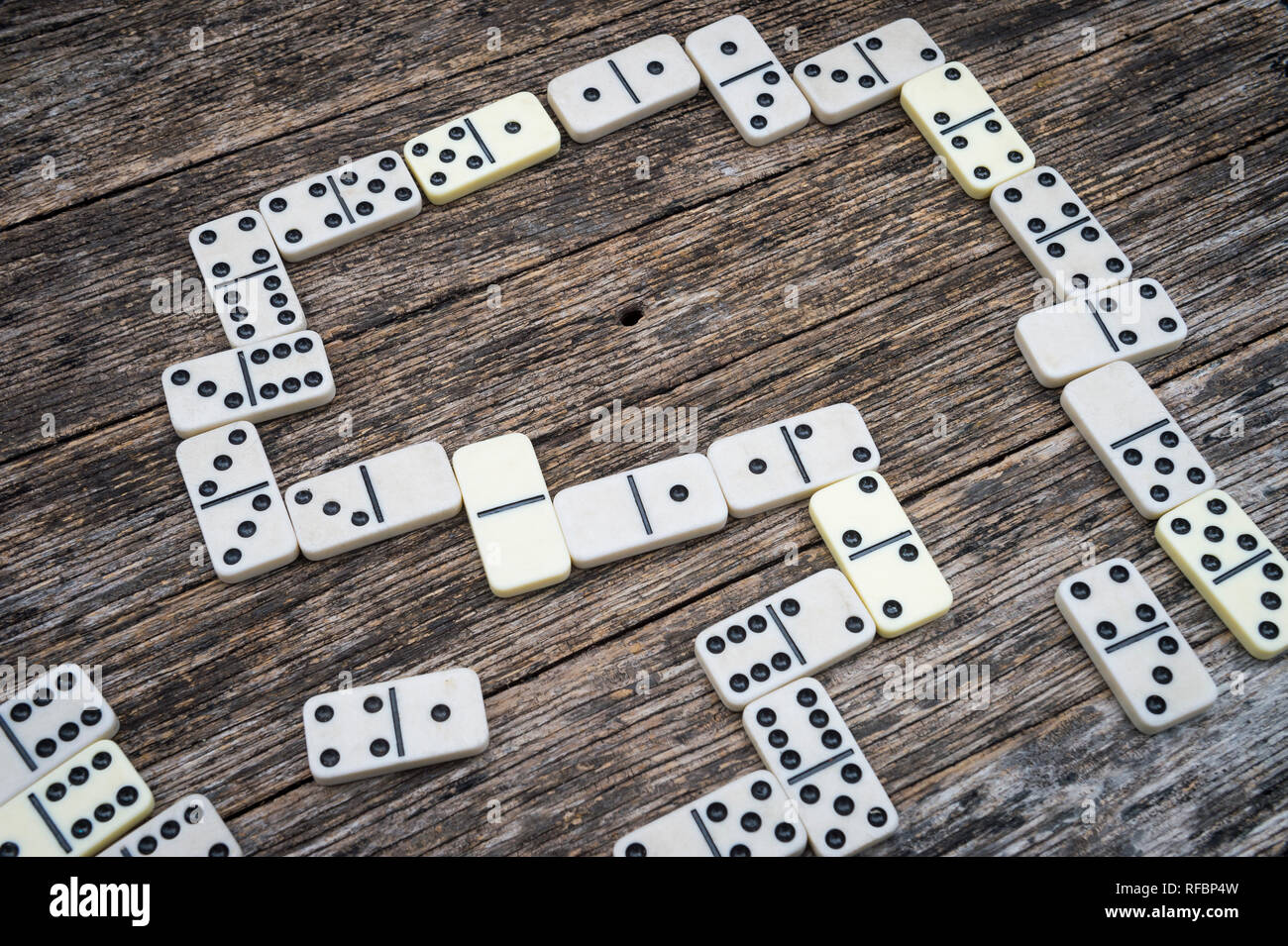 Classic game of Cuban dominoes in progress on an old-fashioned