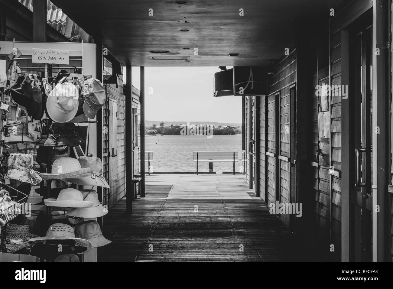 Shops at docks in Perth at Elizabeth Quay in Western Australia at seaside in black and white Stock Photo