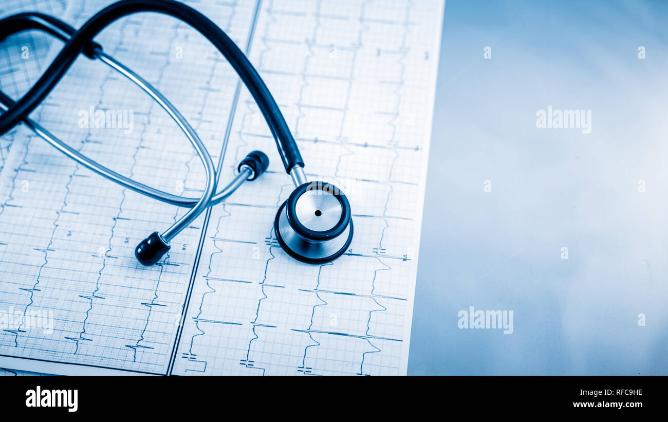 Stethoscope on cardiogram concept for heart care on the desk Stock Photo Alamy