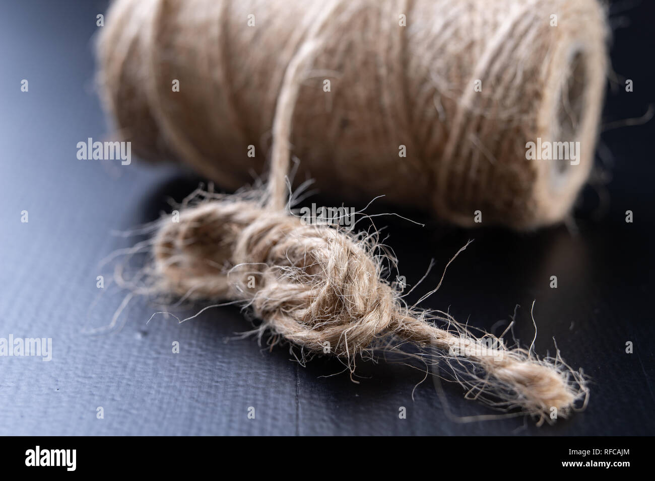 Rope wrapped around wood hi-res stock photography and images - Alamy