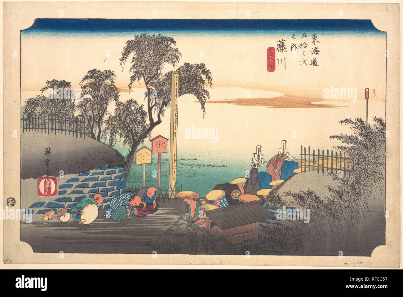 Station Thirty-Eight: Fujikawa, Scene at the Border, from the Fifty-Three Stations of the Tokaido. Artist: Utagawa Hiroshige (Japanese, Tokyo (Edo) 1797-1858 Tokyo (Edo)). Culture: Japan. Dimensions: 9 x 14 in. (22.9 x 35.6 cm). Date: ca. 1833-34.  Officials from Fujikawa bow and welcome a procession representing the Tokugawa government. They traveled from Edo to Kyoto annually to deliver a gift of horses to the emperor on the first day of the eighth month. Hiroshige joined the 1832 procession to Kyoto. Museum: Metropolitan Museum of Art, New York, USA. Stock Photo
