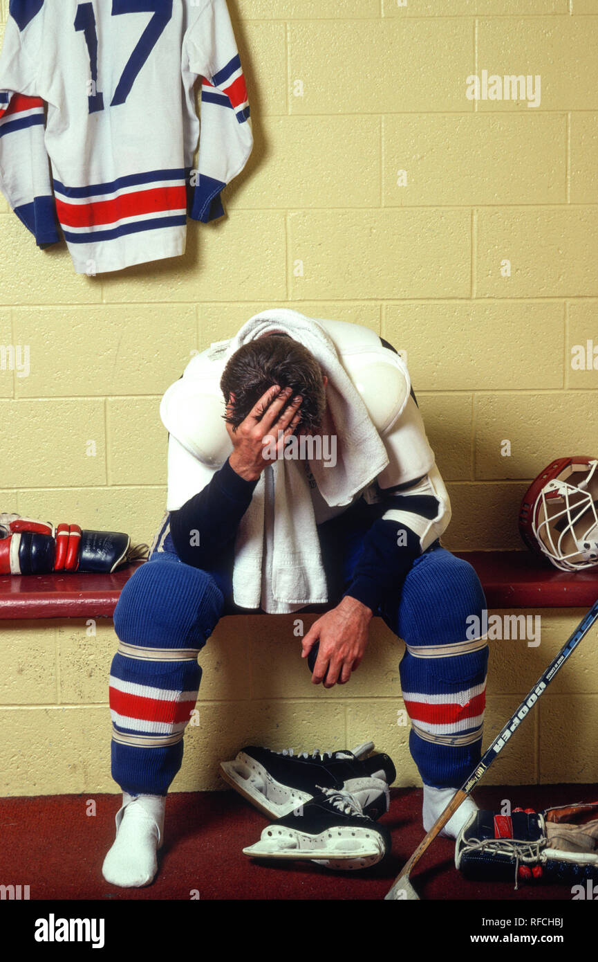 Hockey Player in Locker room after Losing Game, 1990s, USA Stock Photo