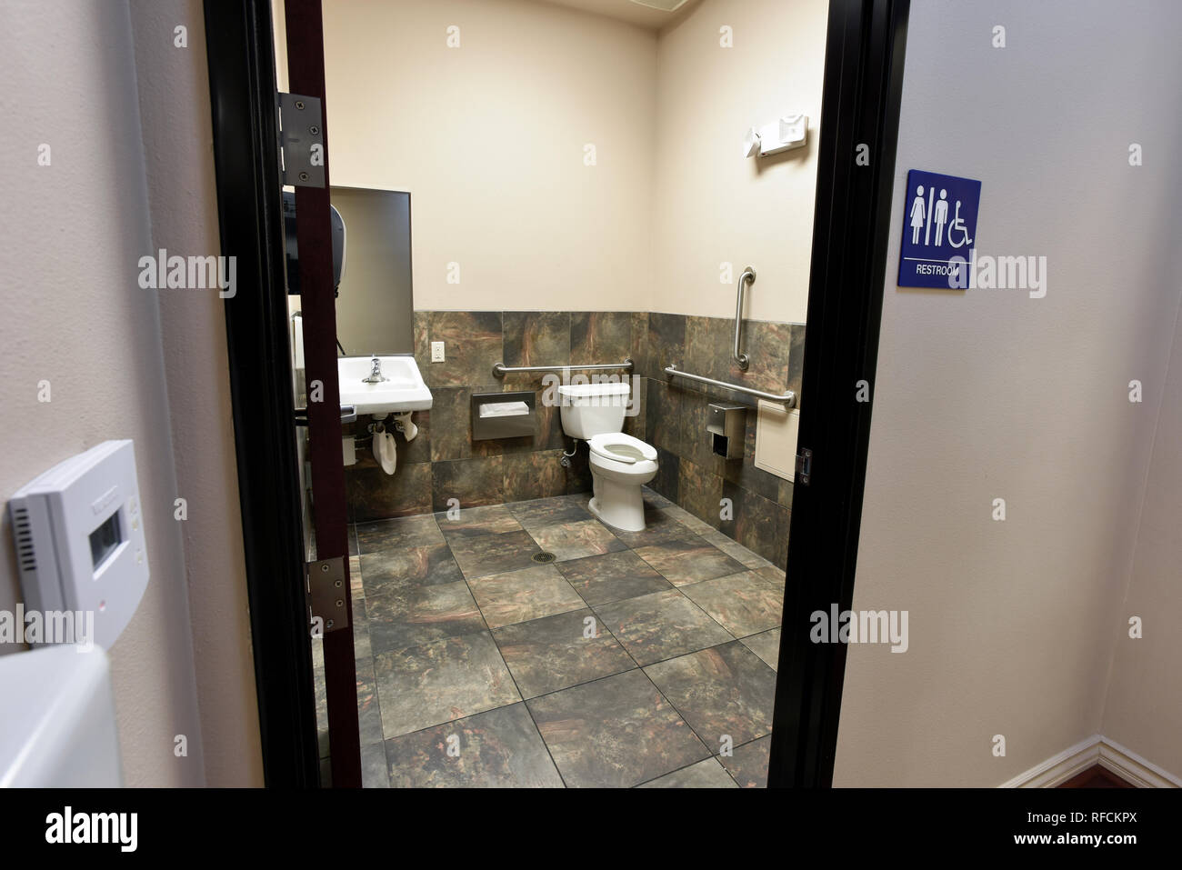 Commercial business bathroom. Stock Photo