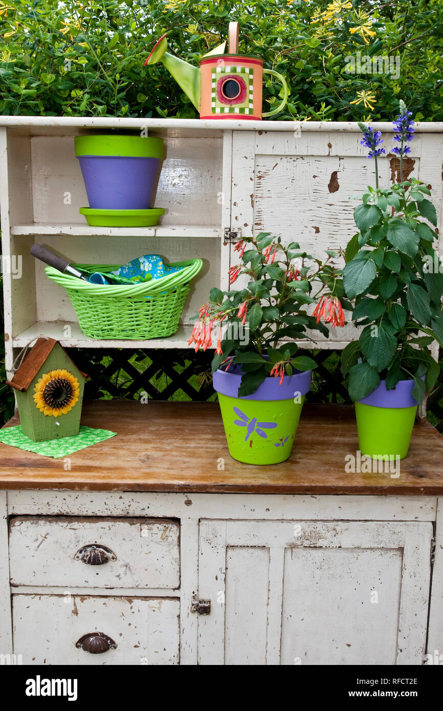 63821-203.09 Potting bench with containers and flowers in spring, Marion Co. IL Stock Photo