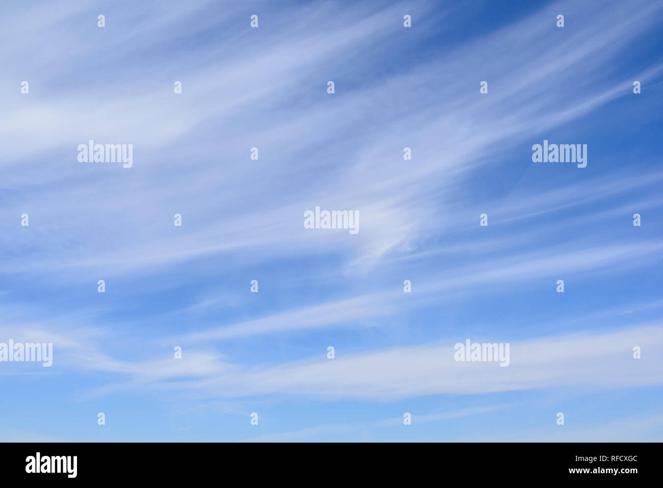 Cirrus clouds on blue sky, thin and wispy Stock Photo