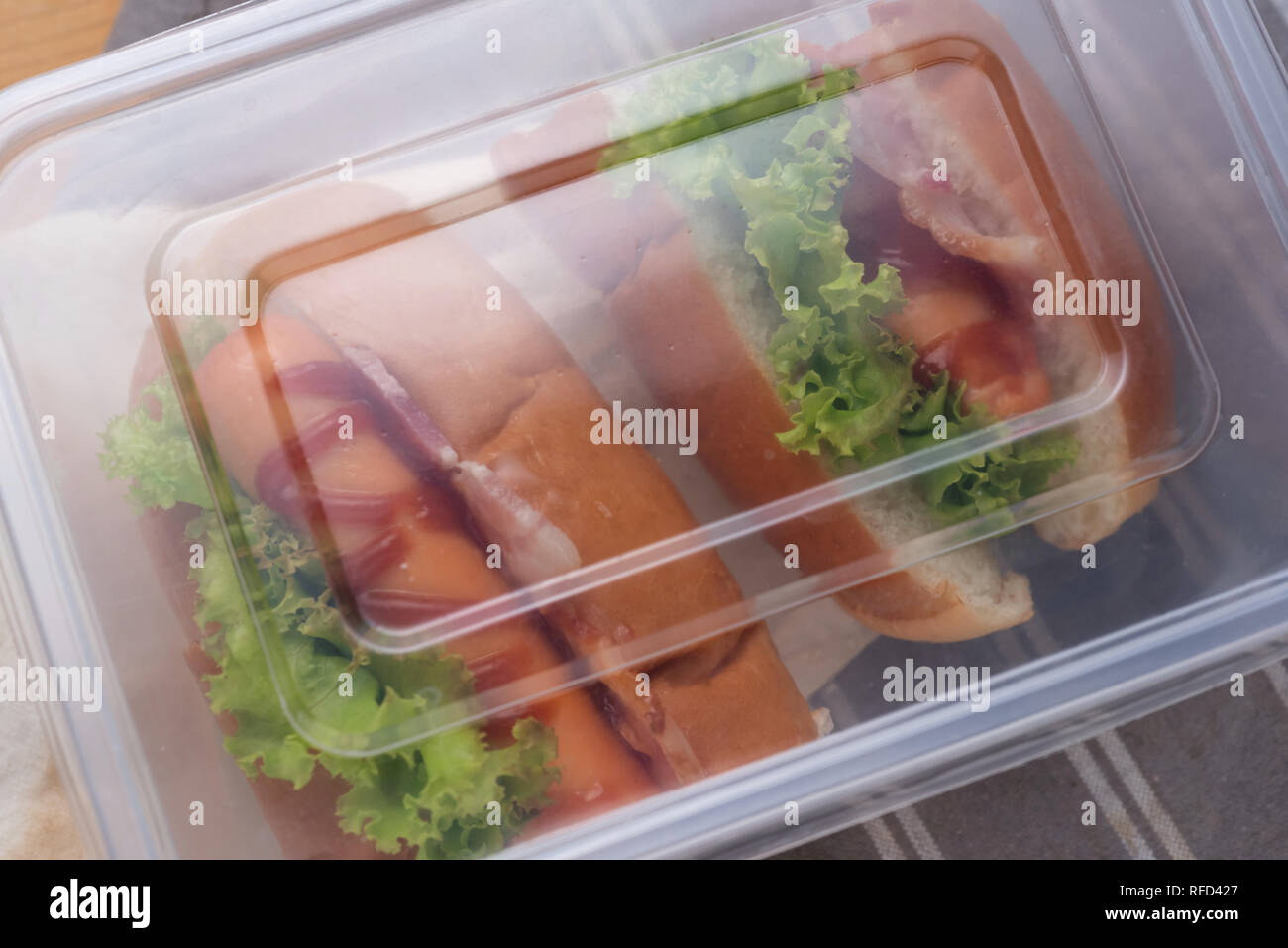 Lunch box of hot dog Stock Photo Alamy