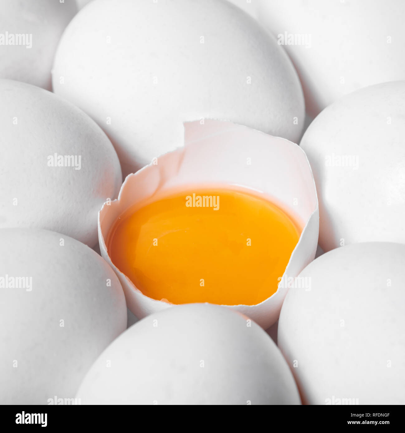 broken and whole chicken eggs, food background Stock Photo - Alamy