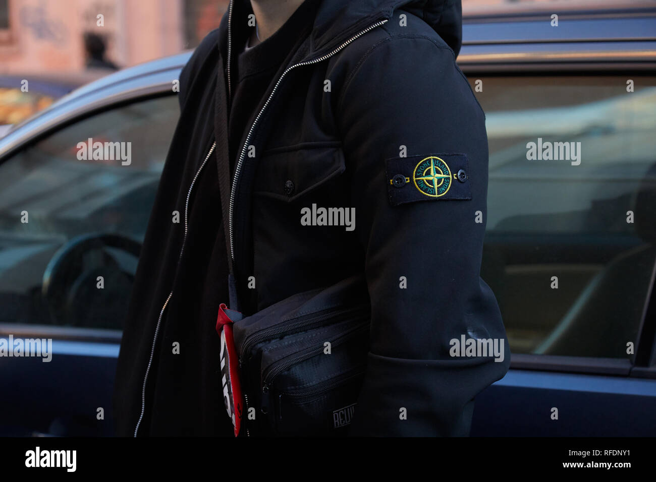 MILAN, ITALY - JANUARY 14, 2019: Man with black Stone Island jacket before  Spyder fashion show, Milan Fashion Week street style Stock Photo - Alamy